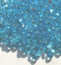 25 grams of 3x7mm Silver Lined Aqua Farfalle Seed Beads